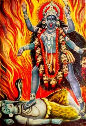 The Hindu goddess Kali standing on the god Shiva